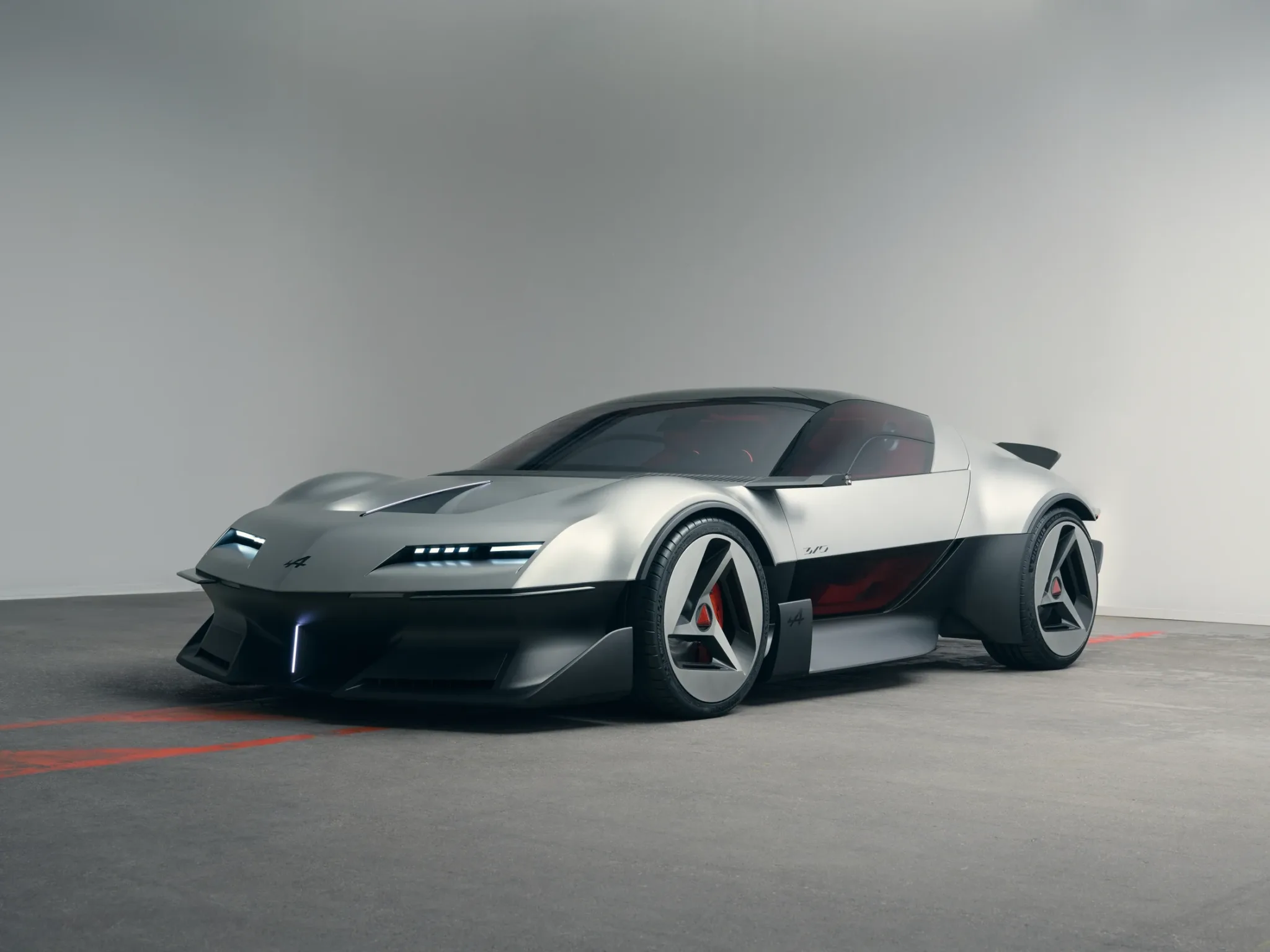 Alpine A310 Vision, concepto deportivo de aluminio con la parte baja en negro, visto de tres cuartos frontal
