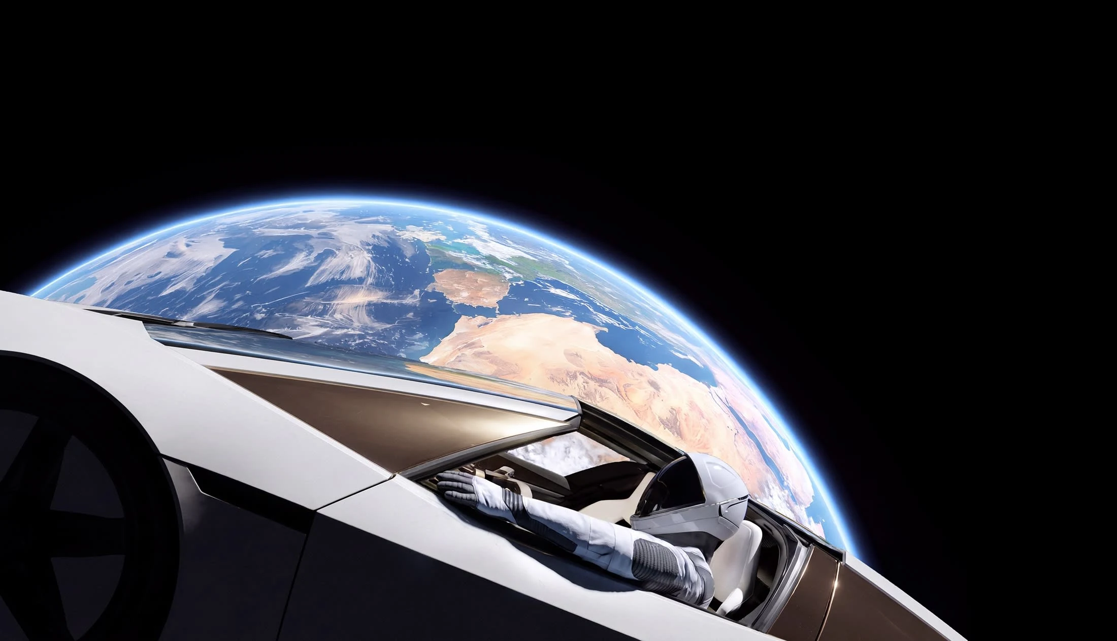 Imagen promocional de Tesla del Roadster en el espacio, con la Tierra de fondo y el interior iluminado